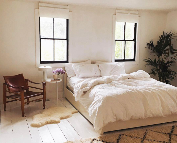 white and beige bedroom with organic sheets