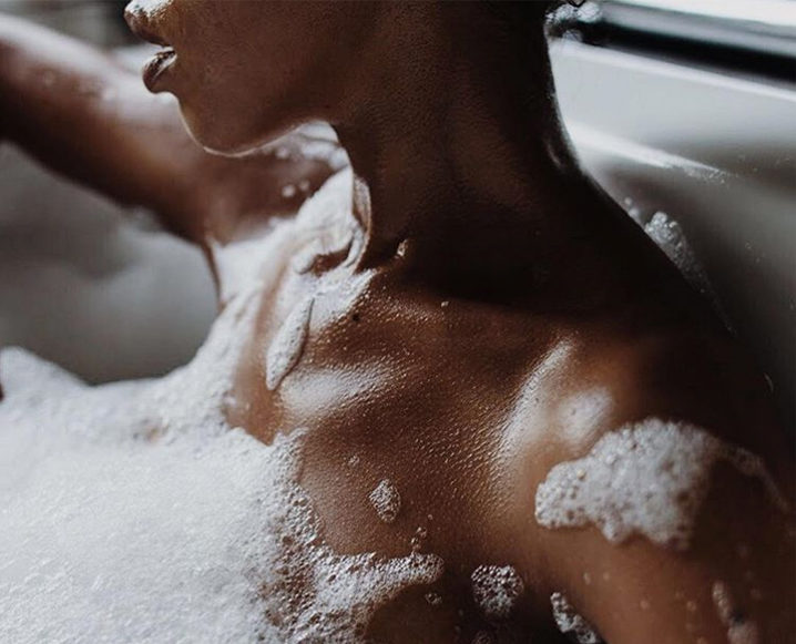 woman in bath with bubbles